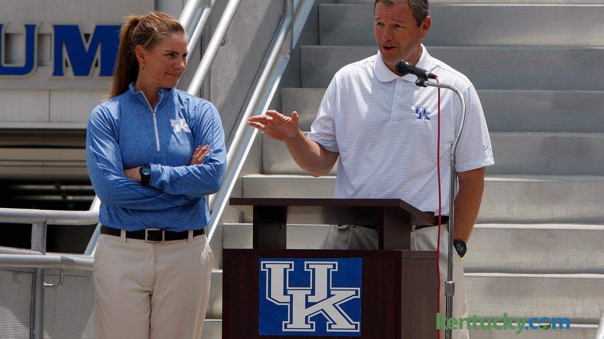 UK athletics director Mitch Barnhart introduces softball coach Rachel Lawson, left, during a season celebration for the UK Softball team at John Cropp Stadium in Lexington, Ky., Sunday, June 1, 2014. Photo by Matt Goins