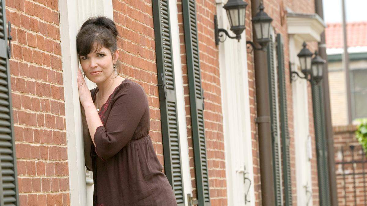 Laurie Genet Preston will play the title role in Belle Brezing, a play written by Margaret Price and presented by Actors Guild of Lexington. The house above is one of Brezing's former homes on Upper Street. Preston said she was eager to play the role.