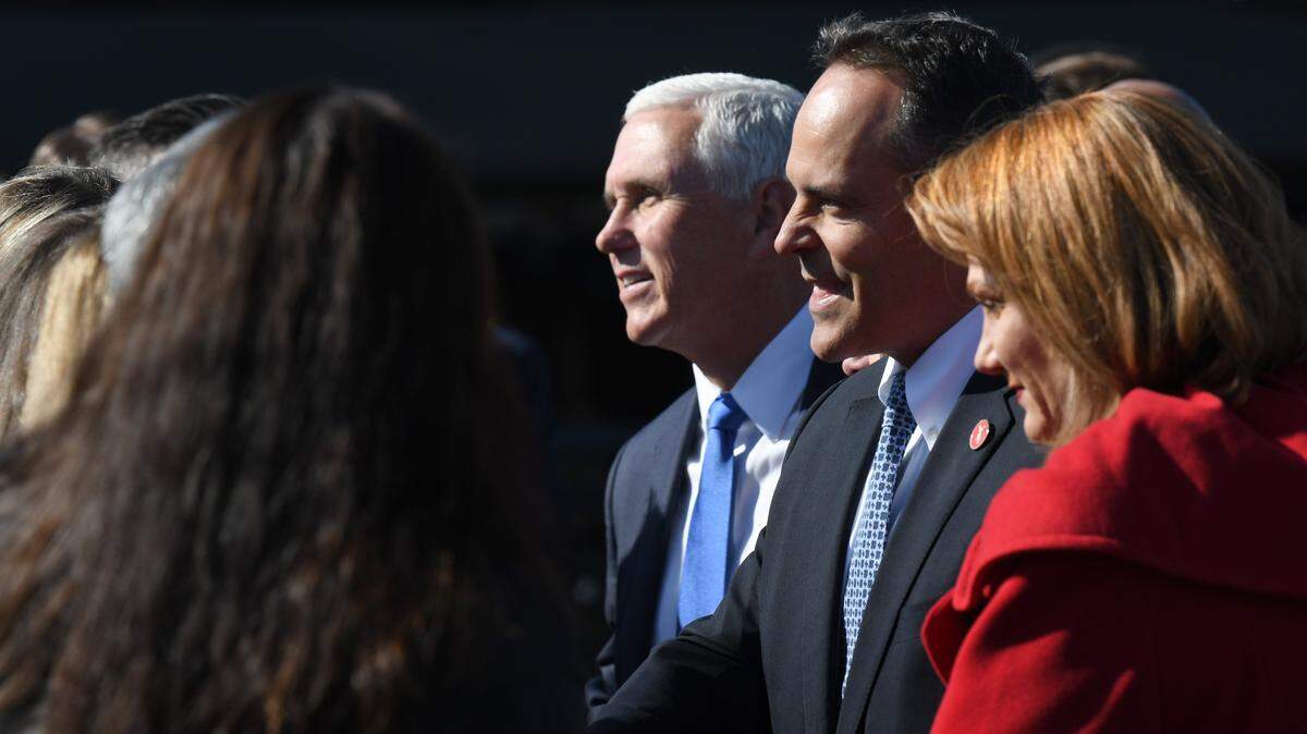 Vie President Mike Pence and Kentucky Gov. Matt Bevin work the crowd at London-Corbin Airport Friday, Nov. 1, 2019, while campaigning before Tuesday’s general election.