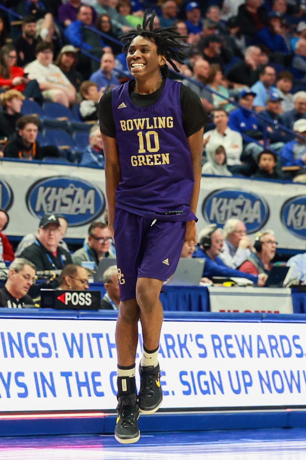 Bowling Green senior Kadyn Carpenter, who contributed 17 points to Friday’s victory, celebrates advancing to the Boys’ Sweet 16 semifinals.