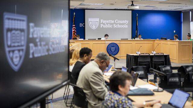 Board members speak during a school board meeting Monday, Aug. 18, 2025, at Fayette County Public Schools Central Office in Lexington, Ky.