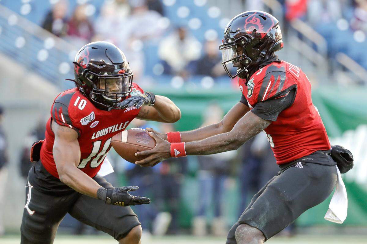 Louisville running back Javian Hawkins (10) and quarterback Micale Cunningham (3) are two of a talented core of offensive playmakers that Bobby Petrino left at U of L for his successor as Cardinals head coach, Scott Satterfield.