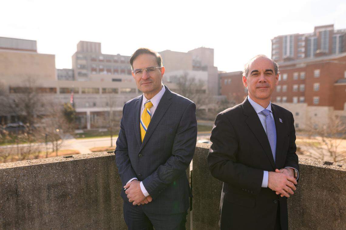 Co-Executive Vice President for Health Affairs Robert DiPaola, left, and Eric Monday pose for a portrait.