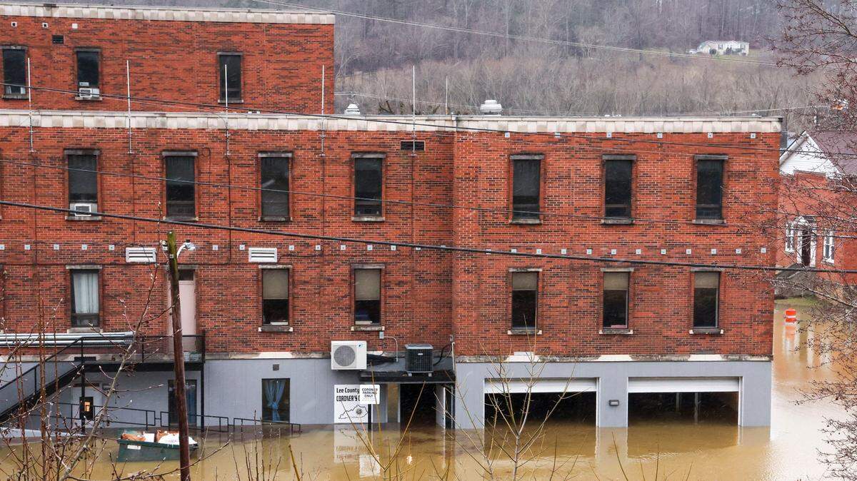 The Lee County Coroner’s Office, Sunday, Feb. 14, 2025, in downtown Beattyville, Ky. is flooded with several feet of water after severe overnight rain hit the Eastern Kentucky town, leaving many parts of the town flooded.