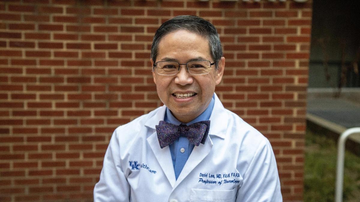 Dr. Daniel O. Lee, Kentucky Neuroscience Institute Medical Director, posing for a photo outside of the Kentucky Clinic on South Limestone Road. March 9, 2021.