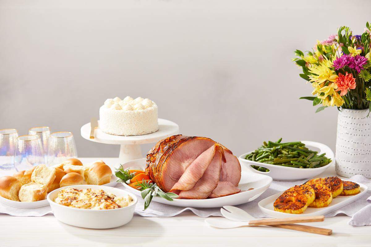 Fresh Market’s complete, ready-to-heat Easter meal is available to order online now is $69.99, and includes a spiral-sliced honey ham, green beans, white cheddar scalloped potatoes, pineapple, rolls and a cake.
