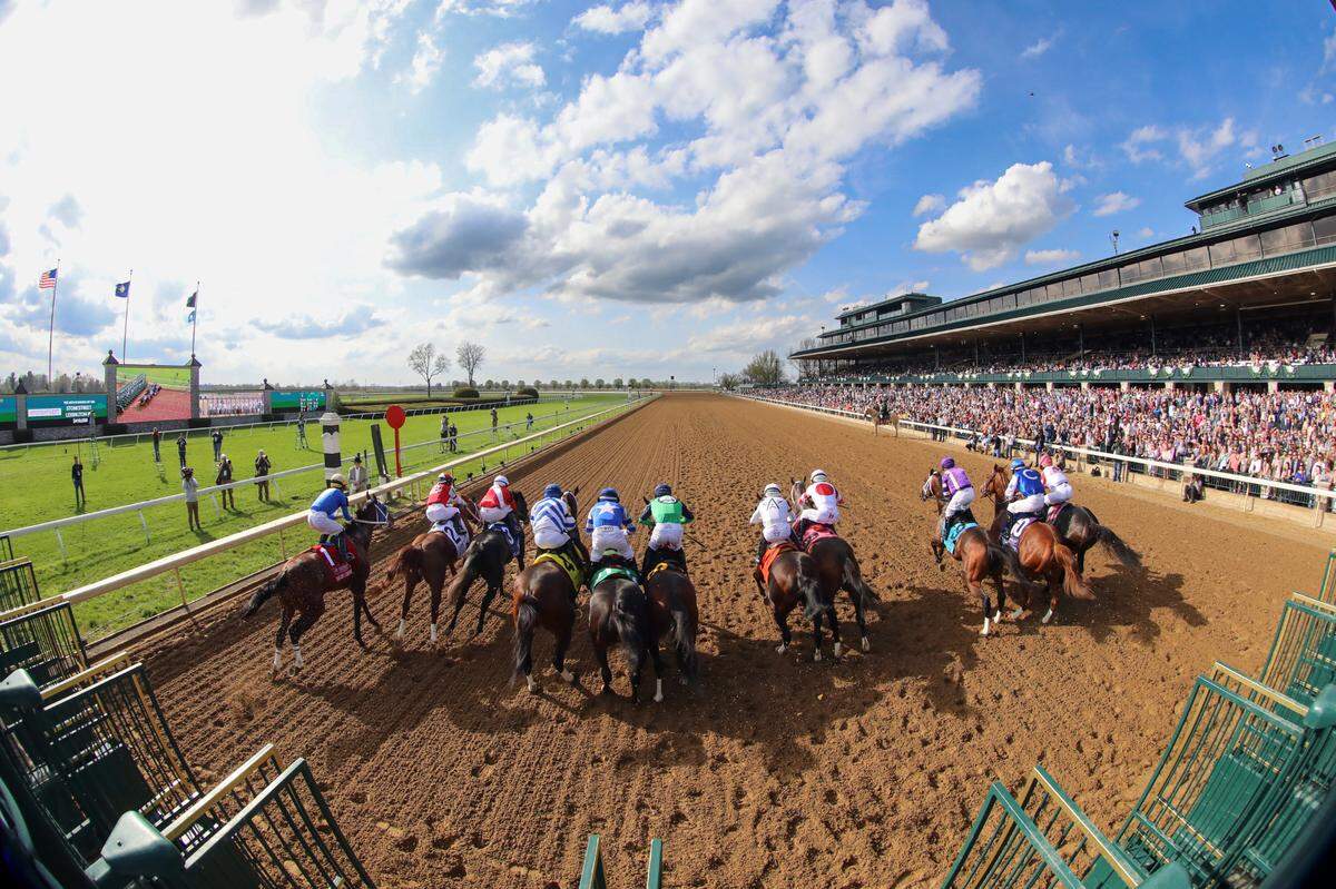 Tawny Port, third from right with Florent Geroux up, wins the Stonestreet Lexington for trainer Brad Cox and owner John Fort on Saturday at Keeneland.