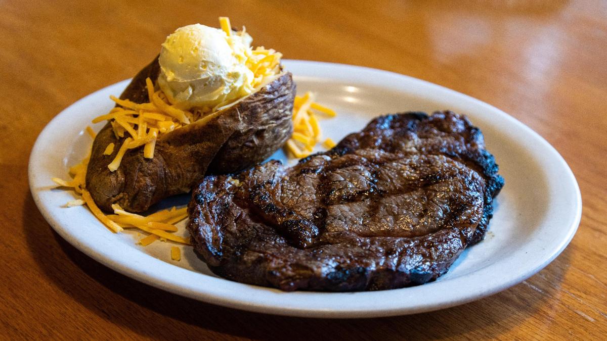 A Steak entree with loaded baked potato from Smokehouse Grill and Buffet in Berea, March 29, 2022.