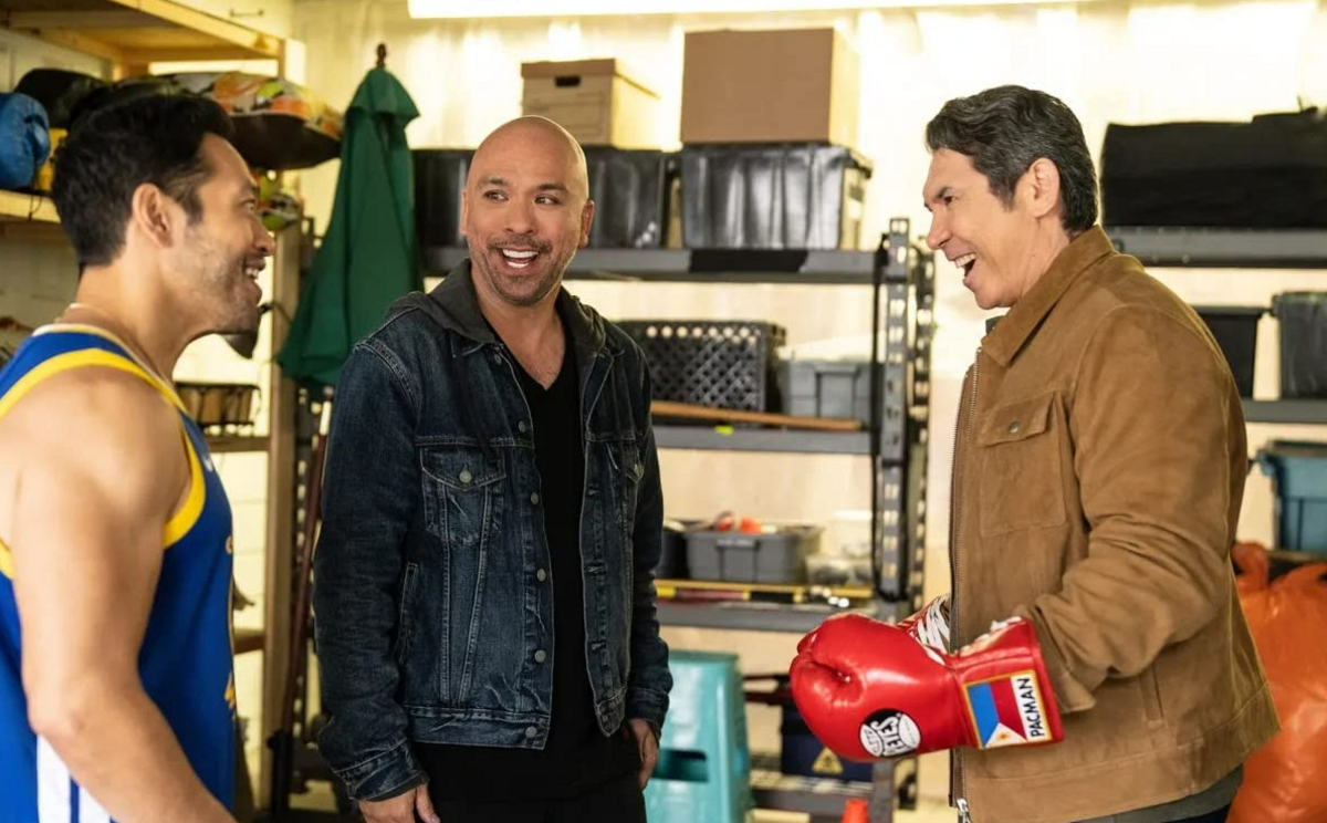 From left, Eugene Cordero, Jo Koy and Lou Diamond Phillips in “Easter Sunday.” Iconic film director Steven Spielberg produced the film based on Koy’s life in comedy.