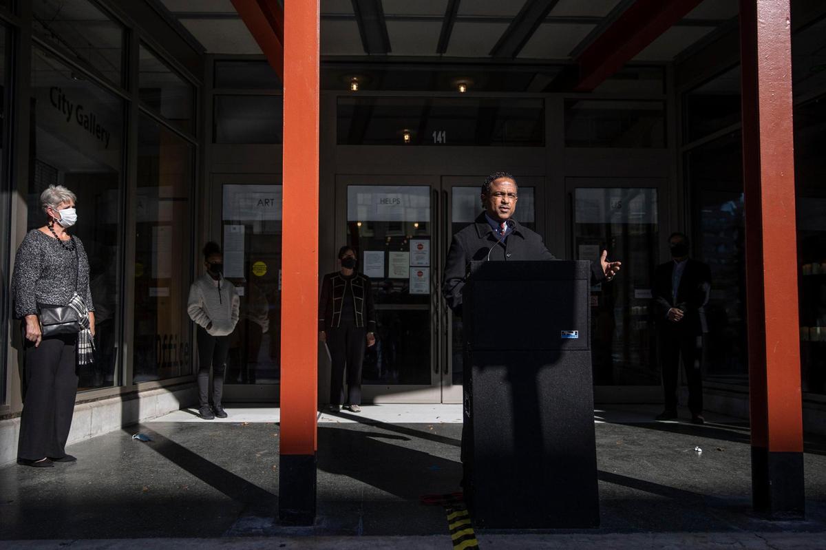 Pastor Keith G. Tyler Sr. of Antioch Missionary Baptist Church speaks Friday outside the Pam Miller Downtown Arts Center.