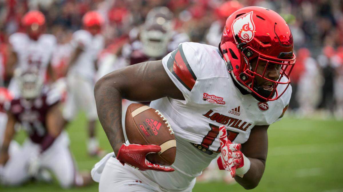 Louisville tight end Kemari Averett, a sophomore, was arrested and charged with wanton endangerment and assault in a suspected domestic violence incident. He was suspended from the football team.