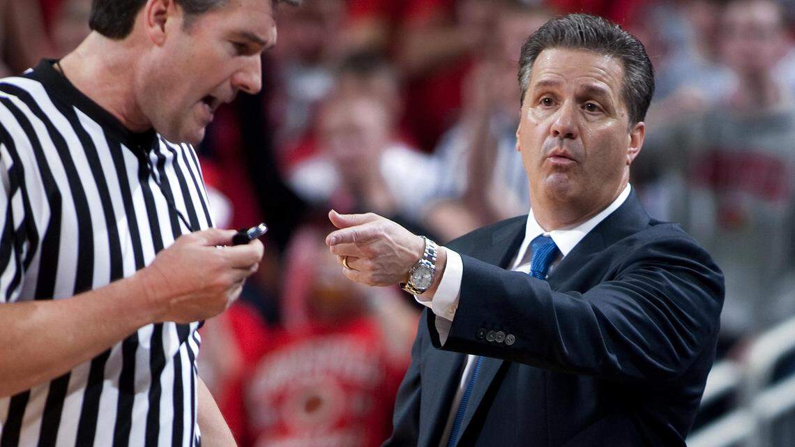 Kentucky Coach John Calipari, right, argued a call with official Doug Shows last December. Shows works as an investment and insurance adviser for a Georgia bank and is also a registered mediator.