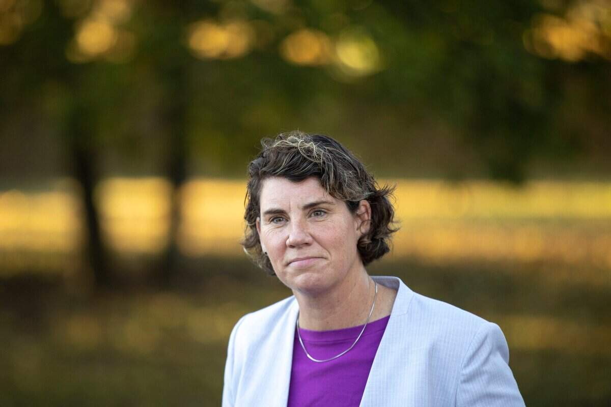 Amy McGrath, Kentucky Democratic candidate for the U.S. Senate, speaks to members of the media before voting during early voting at the Scott County Public Library in Georgetown, Ky., on Tuesday, Oct. 13, 2020.