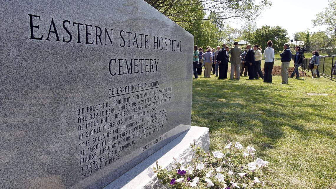 People gathered for a reinterment ceremony for 178 presumed former patients, held at the Eastern State Hospital Cemetery at 4th Street and Newtown Pike on Tuesday.