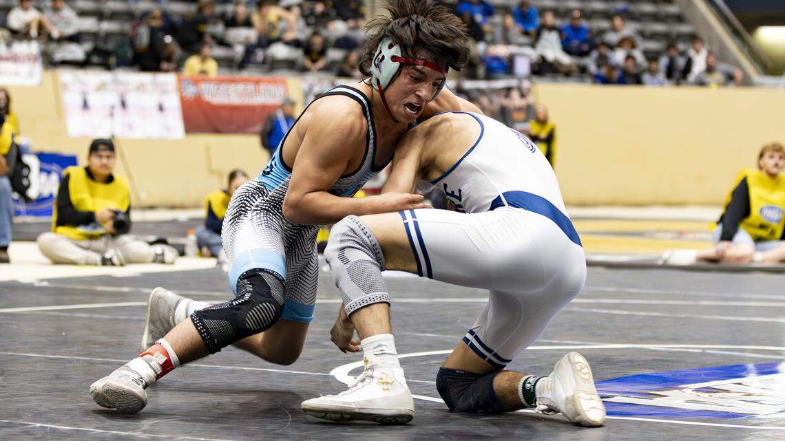 Union County’s Jordyn Raney worked to take down Moore’s Santiago Gonzalez in the 150-pound finals of the 2026 KHSAA Boys/Co-ed State Wrestling Championships at the Kentucky Horse Park’s Alltech Arena on Friday.