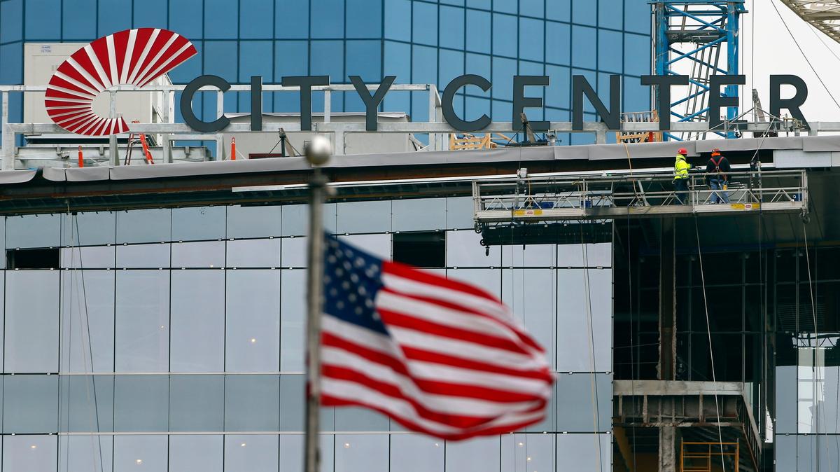 The rooftop sign for the $230 million City Center development in downtown Lexington was installed Thursday. The sign is on the corner of West Main Street and South Limestone Street. Weather permitting, the sign should be illuminated for the first time Friday evening Nov. 30.