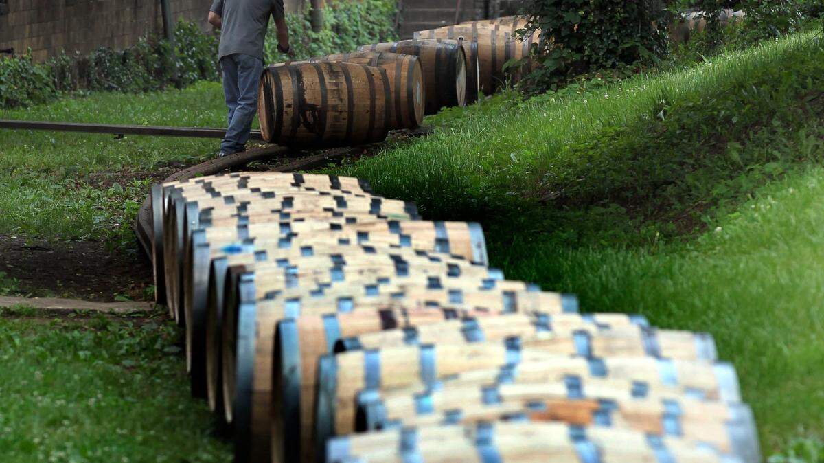 Freshly-filled barrels of Woodford Reserve are moved to a storage warehouse at the Woodford Reserve Distillery, 7855 McCracken Pike, near Versailles, Ky. Photo by Charles Bertram | Staff