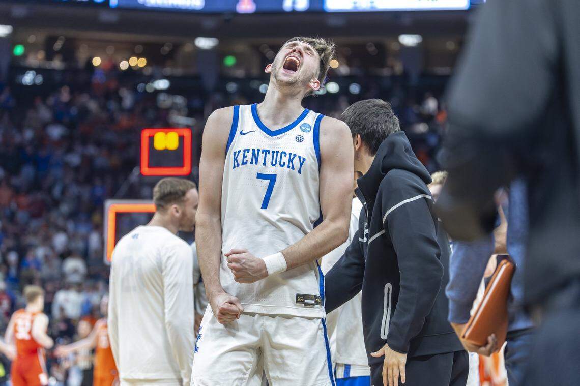 Kentucky forward Andrew Carr celebrates following the Wildcats’ second-round NCAA Tournament victory against Illinois at Fiserv Forum in Milwaukee on Sunday.