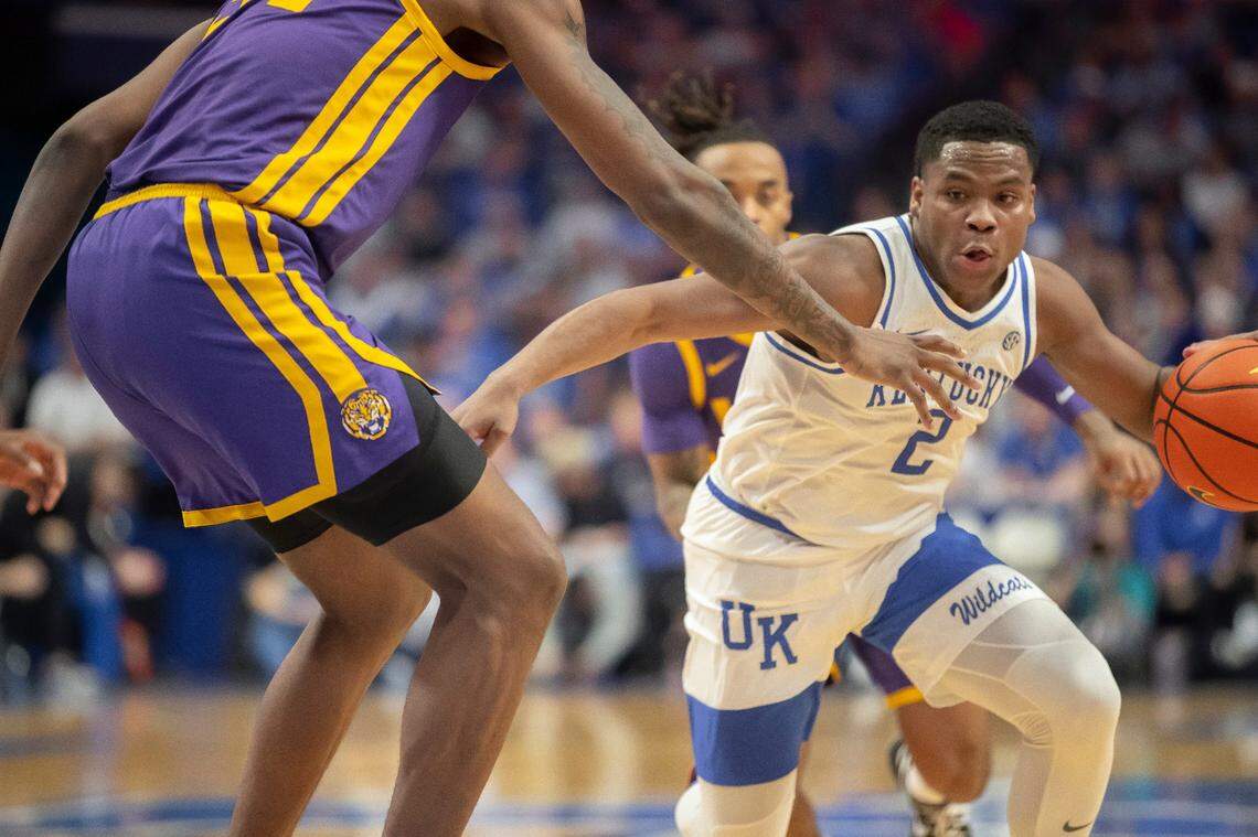 Kentucky’s Sahvir Wheeler (2) drives against LSU’s Shawn Phillips (34) on Tuesday night. Wheeler finished with 11 points, six rebounds and nine assists.