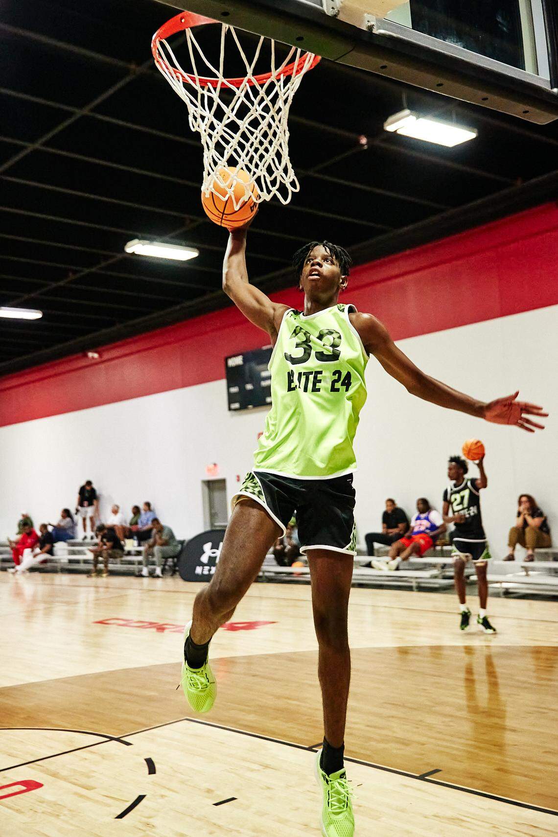 Class of 2025 college basketball recruit Caleb Wilson dunks during the Under Armour Next Elite 24 event in August 2023 at the CORE4 Atlanta facility in Chamblee, Georgia.