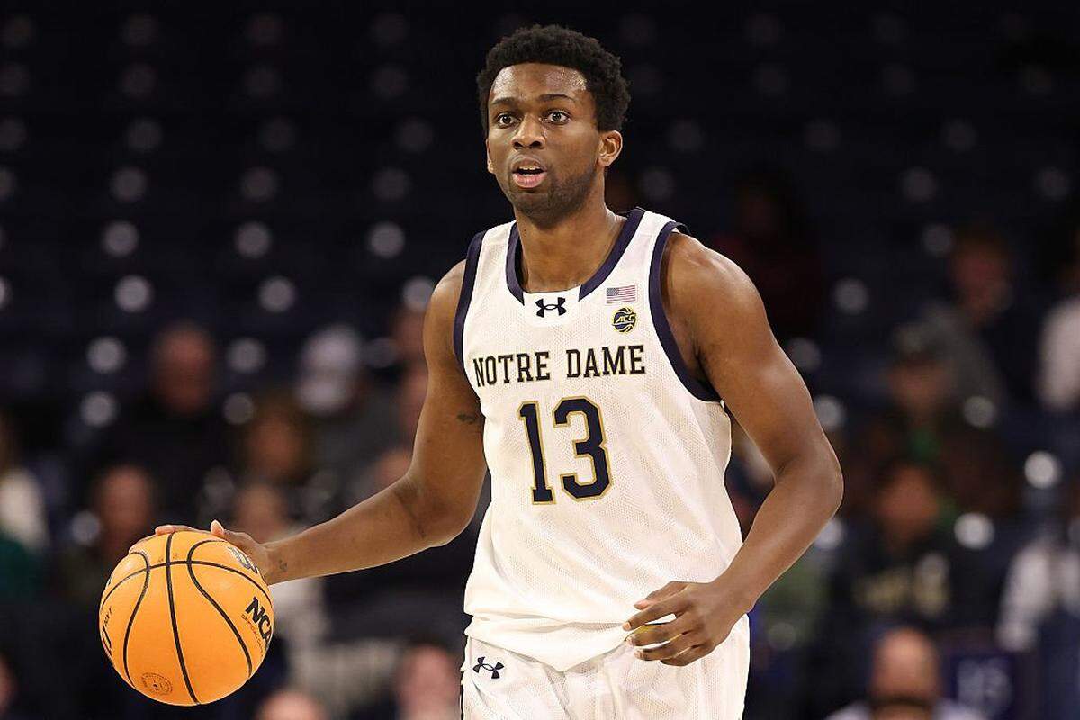 SOUTH BEND, INDIANA - DECEMBER 02: Sir Mohammed #13 of the Notre Dame Fighting Irish dribbles up the court against the Missouri Tigers during the first half at Purcell Pavilion at the Joyce Center on December 02, 2025 in South Bend, Indiana. (Photo by Michael Reaves/Getty Images)