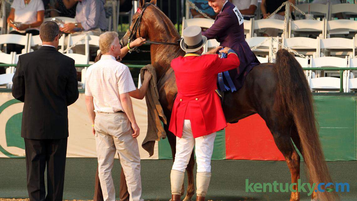 Ceil Wheeler and Callaway's Naughty & Nice were awarded the blue ribbon during the Amateur Three-Gaited, 15.2 hands and under class  of the Junior League Charity Horse Show at the Red Mile in Lexington on Monday, July 6, 2015. Photo by Erin McLaughlin | Staff