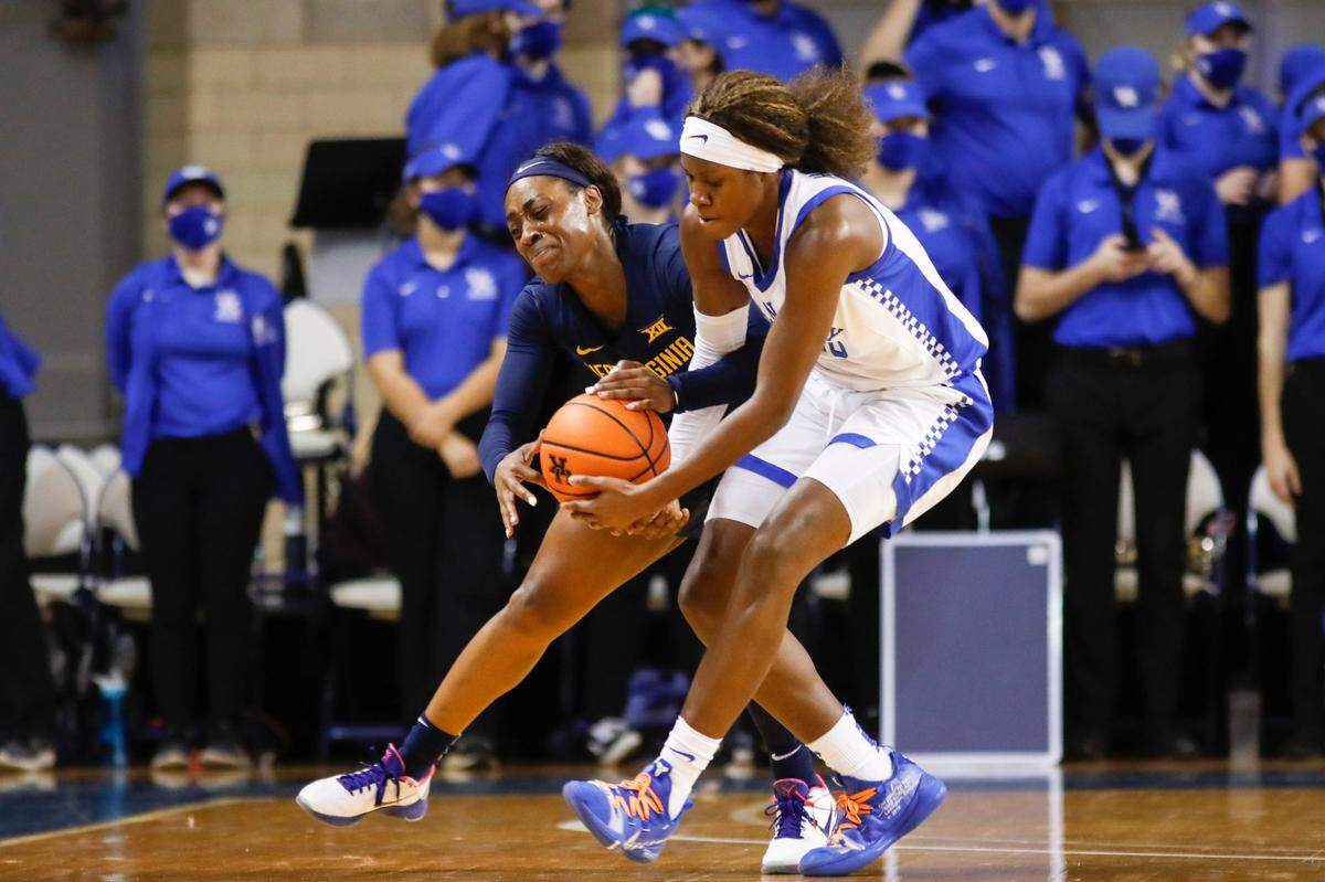 Kentucky’s Rhyne Howard, right, who stole the ball from West Virginia’s Jayla Hemingway on Dec. 1, has averaged 18.7 points, 6.5 rebounds and 4.1 assists this season.