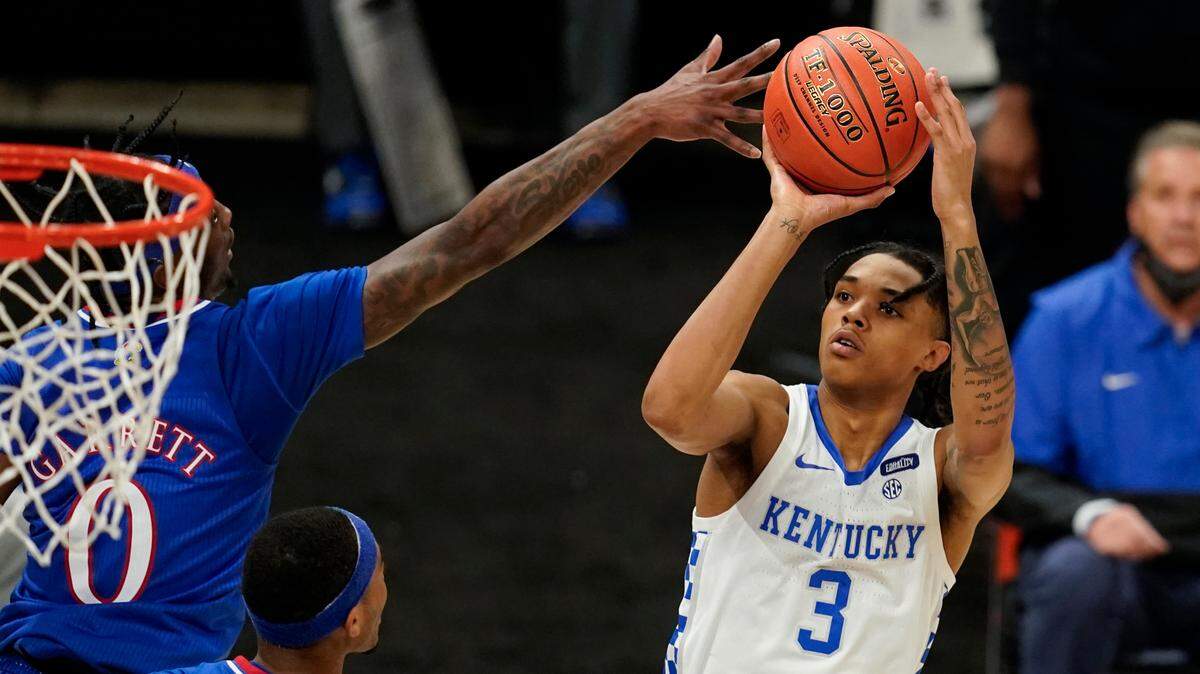 Kentucky’s Brandon Boston (3) took a shot against Kansas’ Marcus Garrett during the second half on Dec. 1, 2020, in Indianapolis.