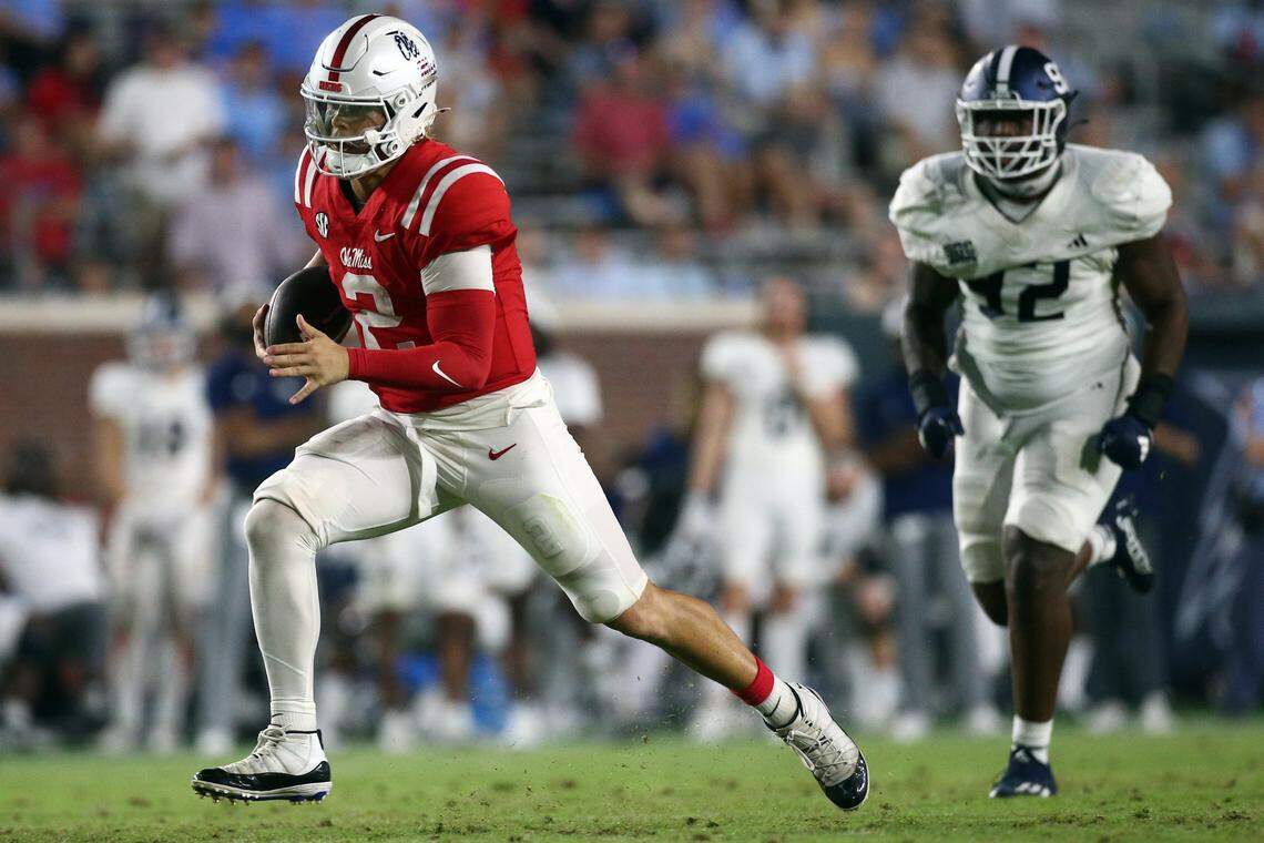Mississippi quarterback Jaxson Dart (2) runs the ball for a first down against Georgia Southern at Vaught-Hemingway Stadium in Oxford, Miss., on Saturday.