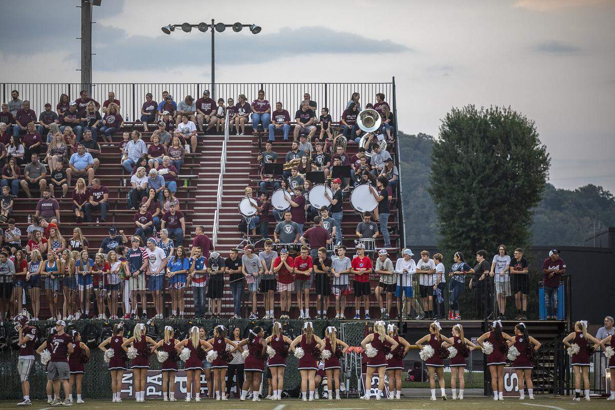 Fans, cheerleaders and members of the band wait for the start of a high school football game between Raceland and Pikeville at the W.C. Hambley Athletic Complex in Pikeville, Ky., Friday, Sept. 13, 2019. The Pikeville Panthers won, 12-6.