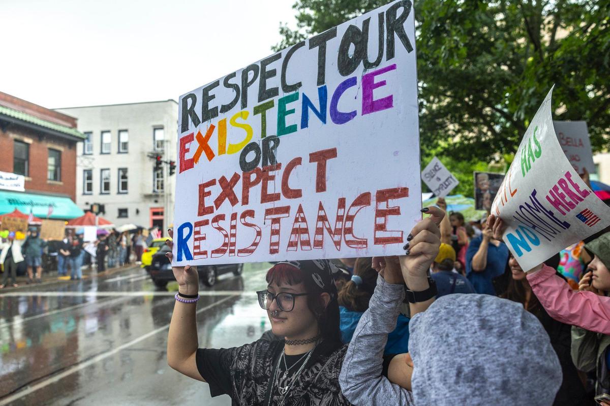 Protesters gather in downtown Lexington, Ky., during the “No Kings” protest on Saturday, June 14, 2025.