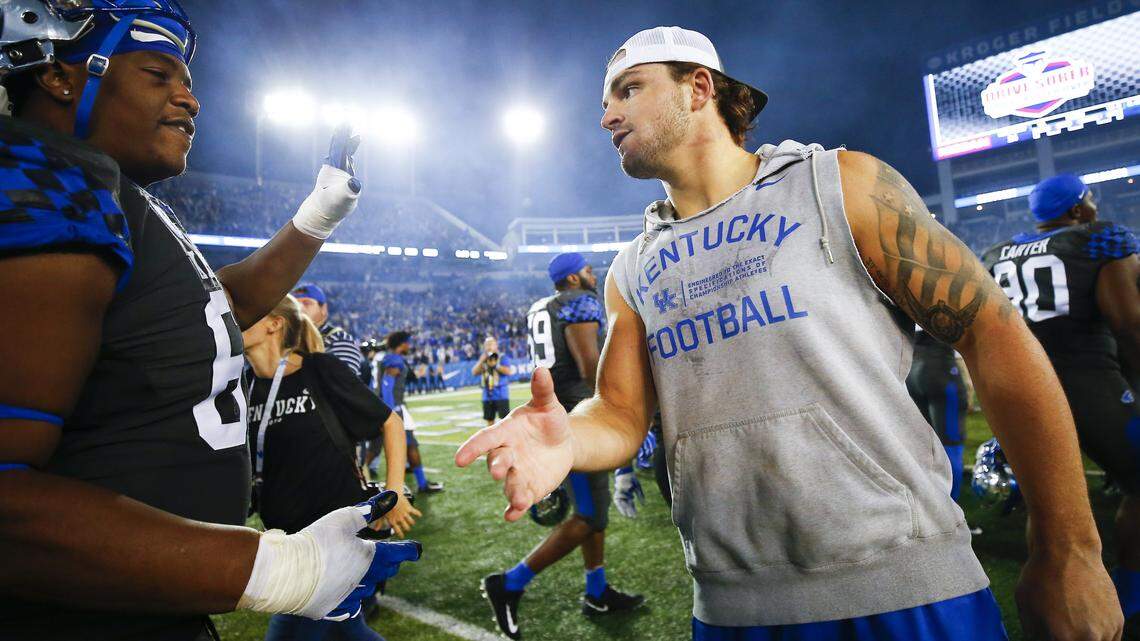UK linebacker Kash Daniel returned to the field to celebrate with teammates after their 24-10 victory over the South Carolina Gamecocks on Saturday at Kroger Field in Lexington. Daniel was ejected from the game in the third quarter for targeting.