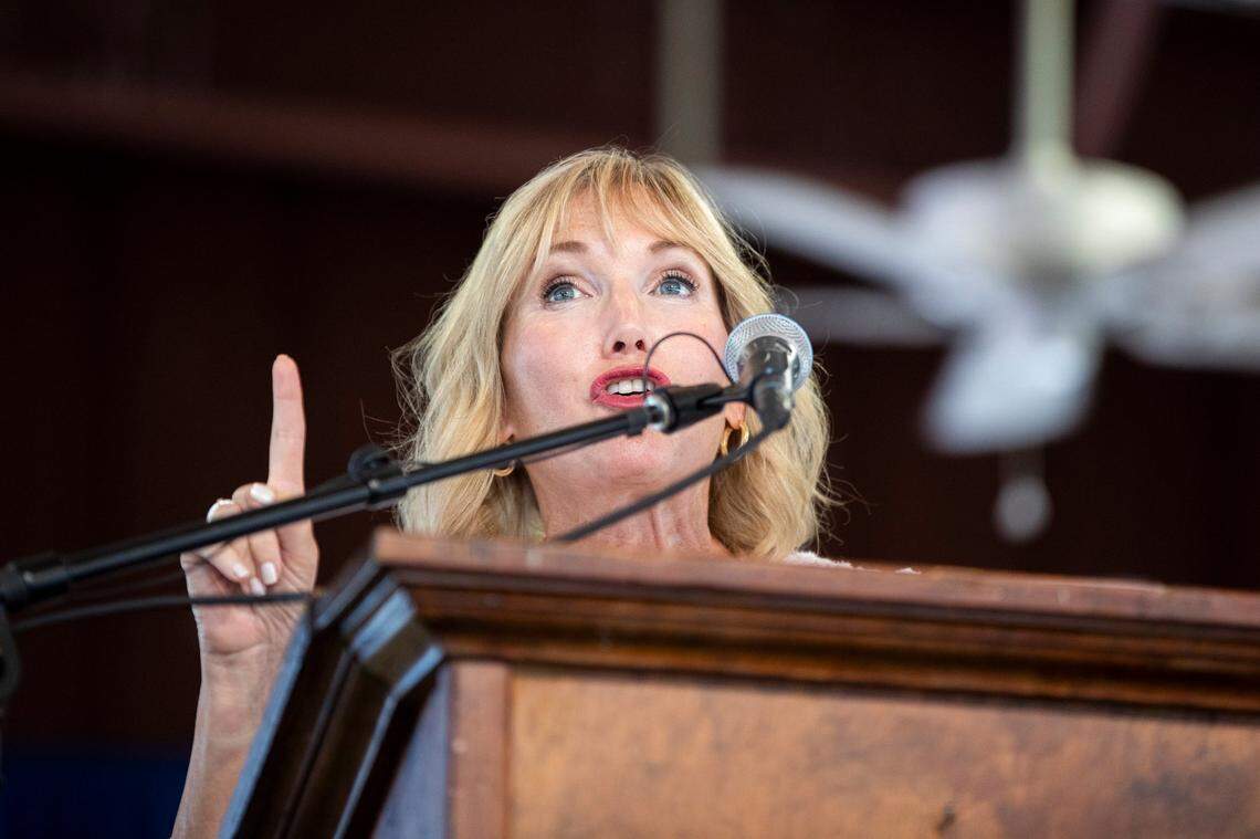 Kelley Paul, wife of Sen. Rand Paul, speaks behind the podium during the 142nd annual St. Jeromes Fancy Farm Picnic before politicians deliver speeches in Fancy Farm, Ky., Saturday, August 6, 2022.