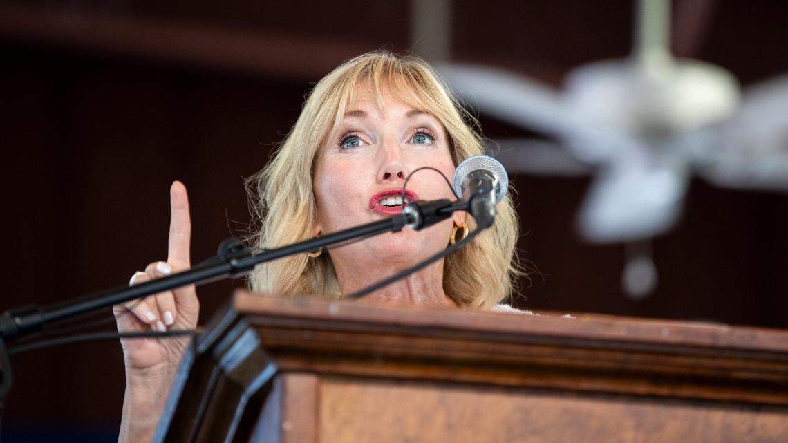 Kelley Paul, wife of Sen. Rand Paul, speaks behind the podium during the 142nd annual St. Jeromes Fancy Farm Picnic before politicians deliver speeches in Fancy Farm, Ky., Saturday, August 6, 2022.