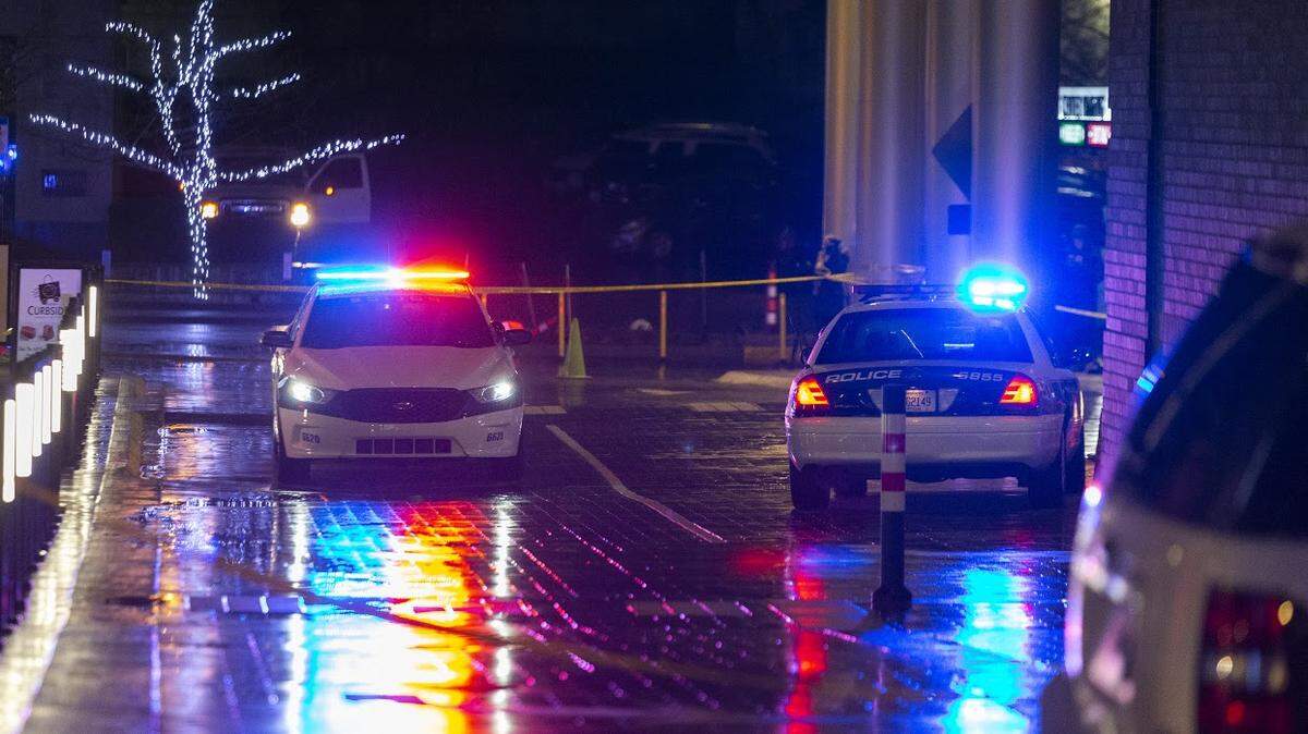 Police investigate the scene of a reported shooting outside the Residence Inn by Marriott in Lexington, Ky., Sunday, January 31, 2021.