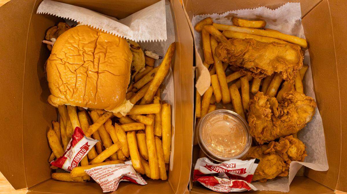 The 3-piece chicken tenders and hot honey sandwich combination meals with fries at Birdies Chicken in downtown Lexington.