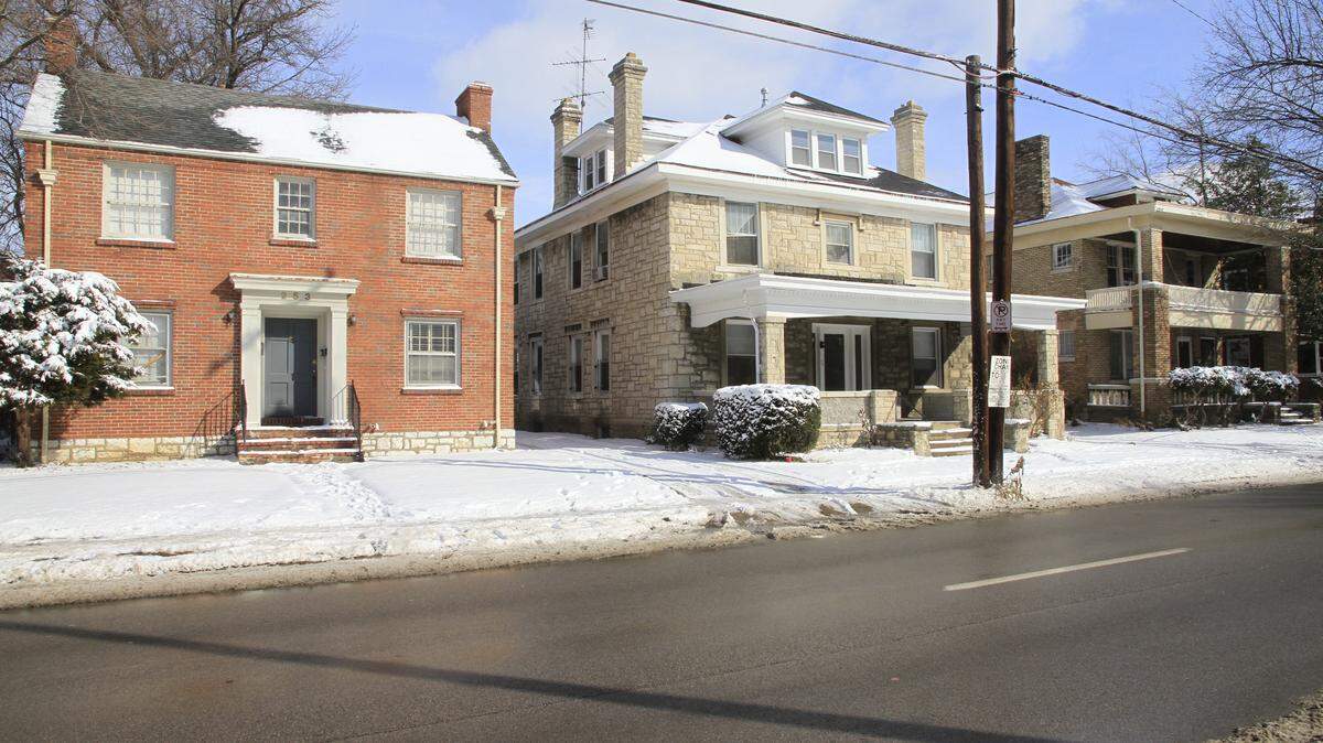 Alpha Phi sorority wants to demolish these three houses, left to right, 253, 255 and 261 East Maxwell Street to build a sorority house. Neighbors and downtown supporters are opposed. January 21, 2011. Photo by Ron Garrison | Staff