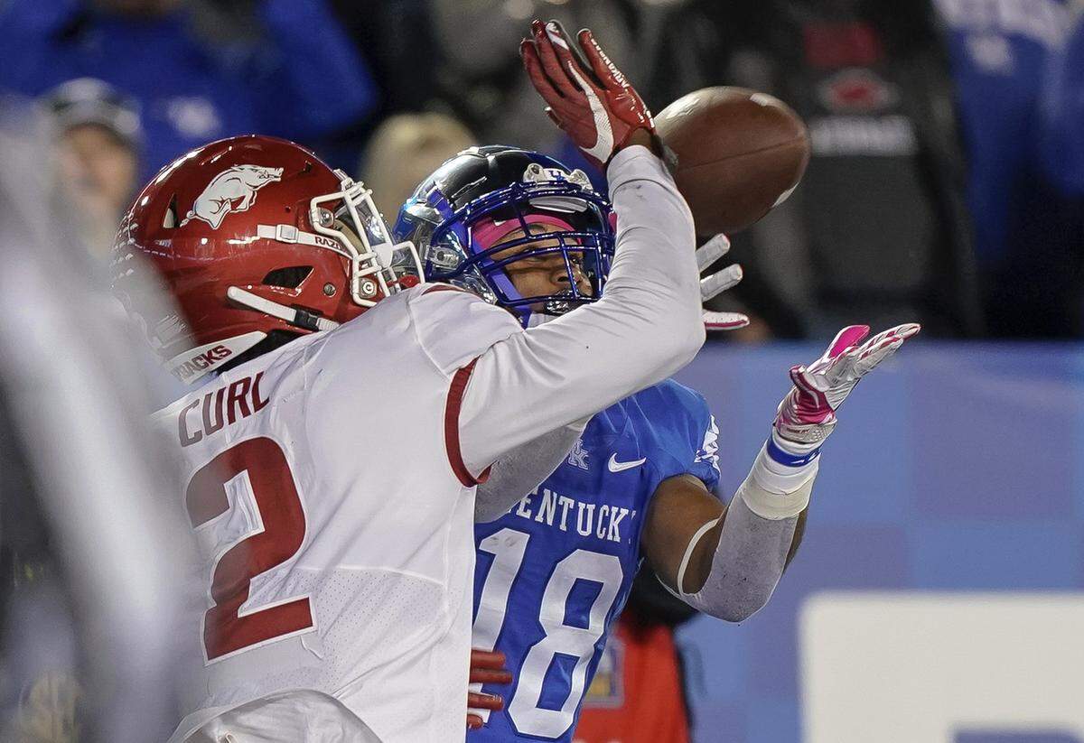 Kentucky wide receiver Clevan Thomas (18) hauled in this 10-yard touchdown catch in UK’s 24-20 win over Arkansas last week. It was the first career TD reception for the redshirt sophomore slot receiver.