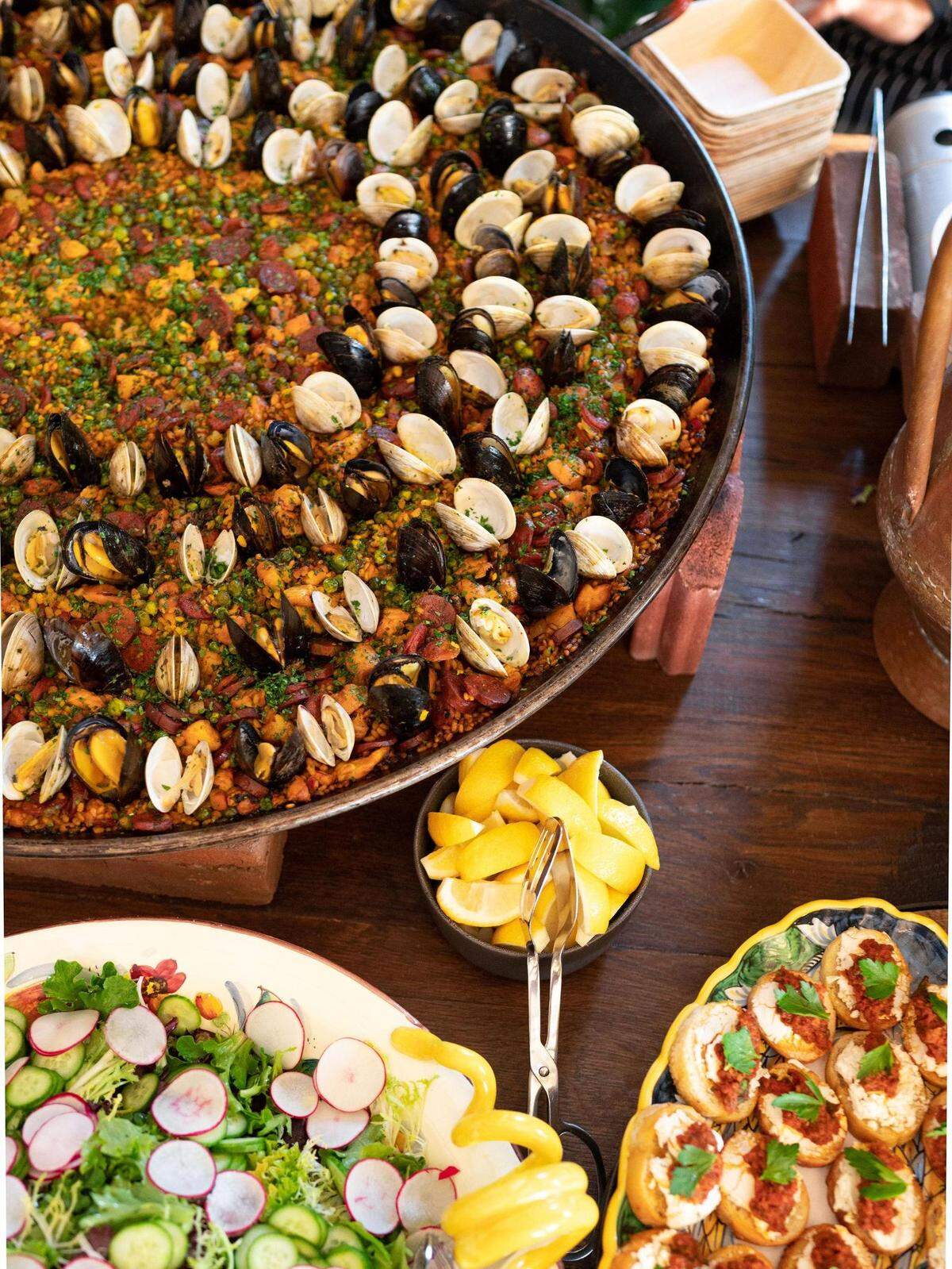 Apiary chef Cooper Vaughan serves innovative meals based on cuisines from around the world in his Omage series, including a Barcelona dinner that featured paella.