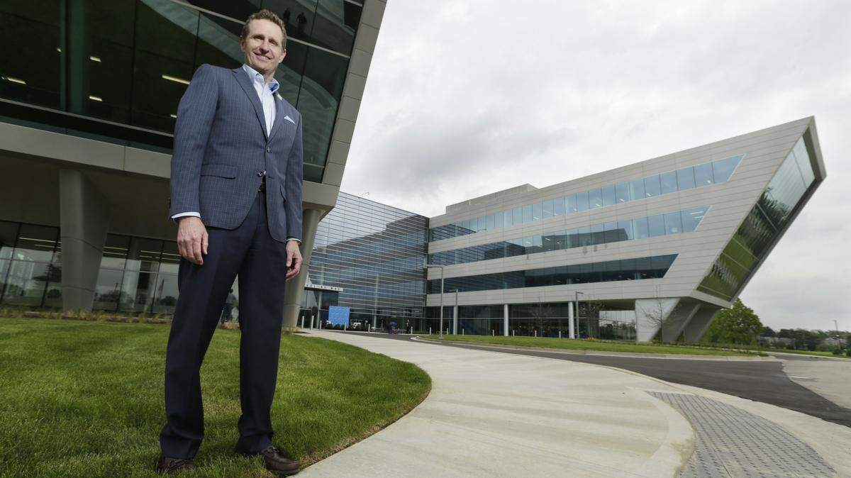 CEO Sam Mitchell posed outside Valvoline’s new world headquarters building in Lexington on May 11, 2017. The new building features open workspaces with collaboration spaces, sit-to-stand desks and incorporates race car themes in the decor.