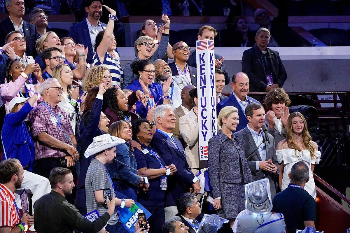 Gov. Andy Beshear casts votes for Kentucky during the second day of the Democratic National Convention at the United Center, Aug. 21, 2024.