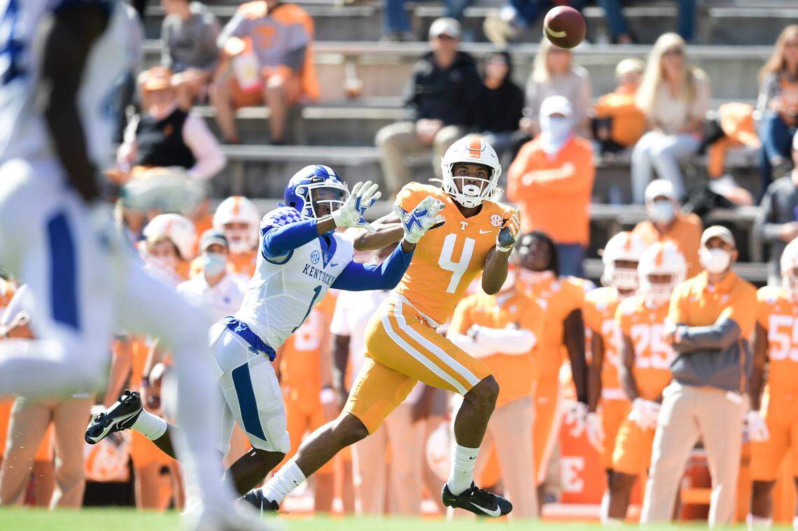 Kelvin Joseph (1) intercepts a ball intended for Tennessee wide receiver Cedric Tillman (4) and runs it back for a touchdown in a 34-7 Kentucky win at Tennessee in 2020.