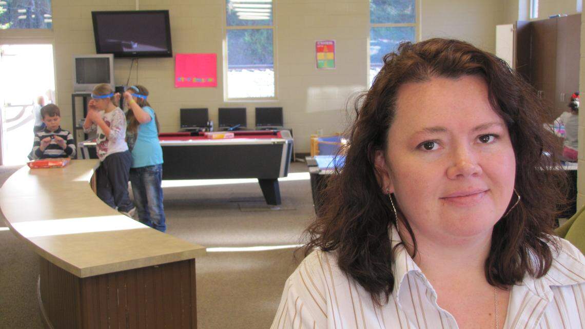 Kateena Haynes, director of the Harlan County Boys and Girls Club, worked to get money for a grief-counseling program after parents of 13 club participants died of drug overdoses in one winter. Photo by Bill Estep | Staff