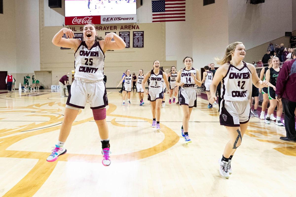Owen County’s Lexie Moore (25) celebrates after the Rebels defeated Owensboro Catholic in the championship game of the girls’ All “A” Classic in Richmond on Sunday. Moore finished with 19 points and 12 rebounds and was named tournament MVP.