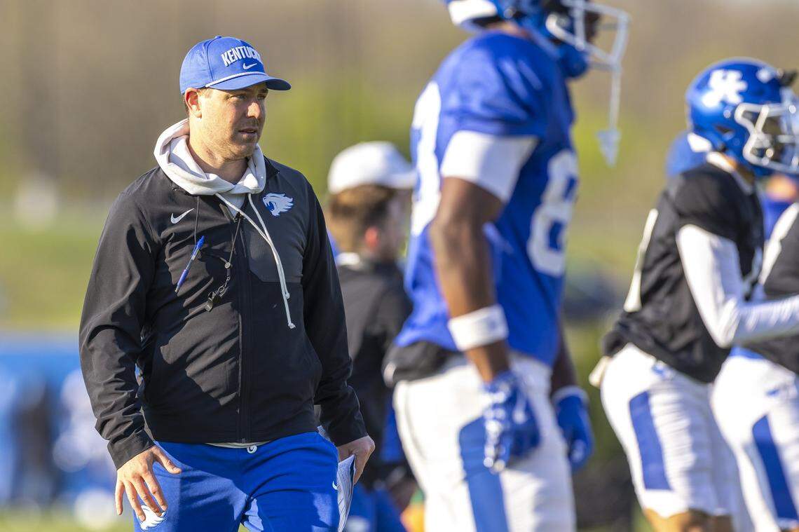 Kentucky head coach Will Stein watches his team during practice at the Joe Craft Football Training Facility in Lexington, Ky., on Tuesday, April 7, 2026.