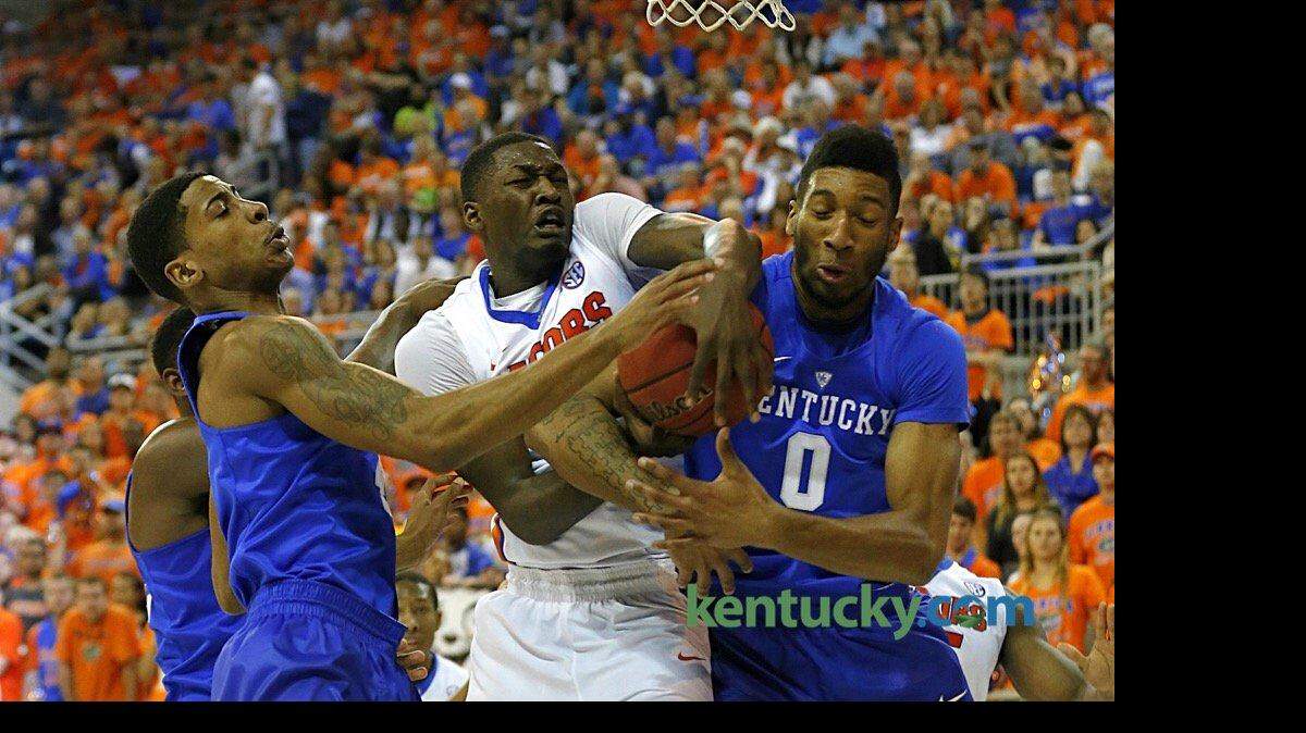 Matthews and Lee battle for a rebound.