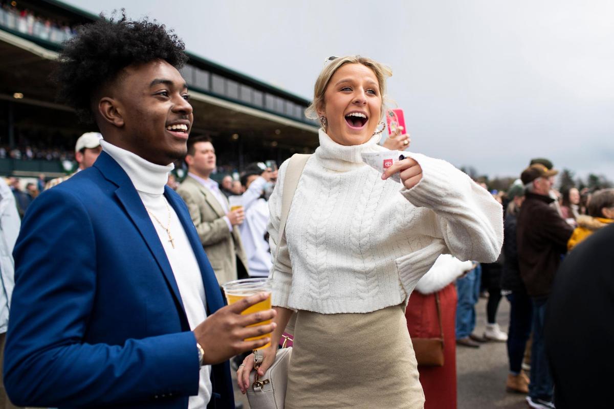 Emily Hukill of Lexington enjoyed watching the horse she bet on win a race at Keeneland on Friday.