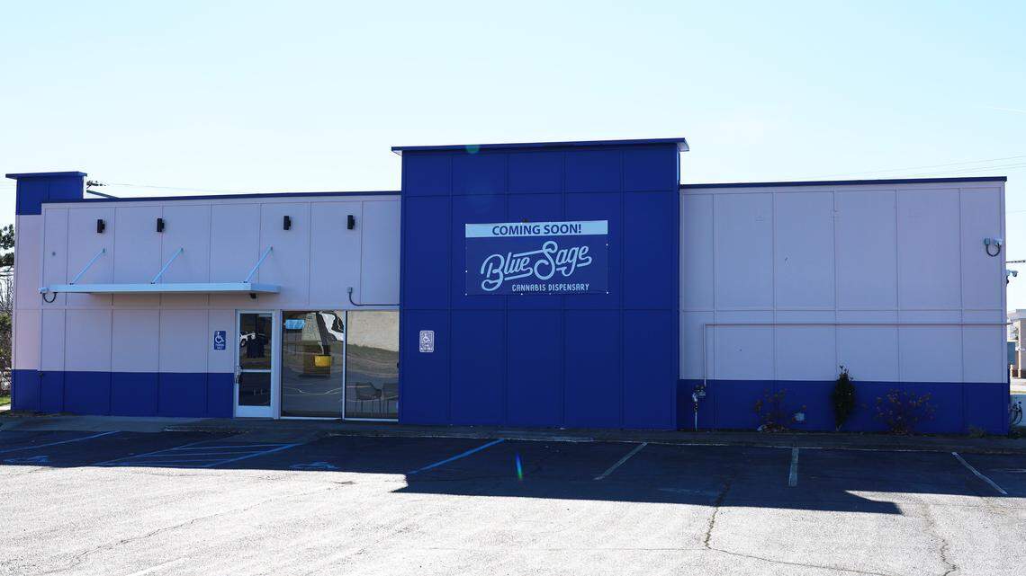 A “Coming Soon” sign hangs on the exterior of Blue Sage, a new medical marijuana dispensary set to open on 172 Imperial Way, in Nicholasville, Ky, on Jan. 12, 2026.