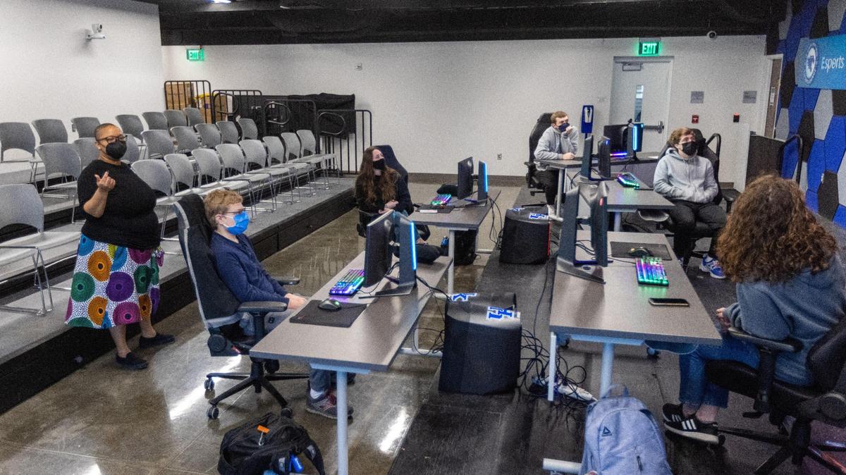 Kishonna Gray, left, an associate professor of Writing, Rhetoric, and Digital Studies, teaches her Games Identity Culture class within University of Kentucky’s Esports Lounge. Kishonna is one of about 50 researchers within the Commonwealth Institute for Black Studies at the University of Kentucky, and focuses her research around representation and cultural depictions in video games. February 16, 2022.