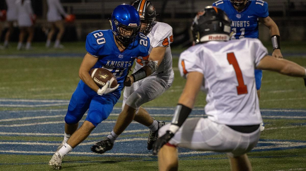 Lexington Catholic’s Keith Brinkman (20) looked for running room as Lexington Catholic hosted Ryle on  Friday Aug. 24, 2018 in Lexington, Ky.